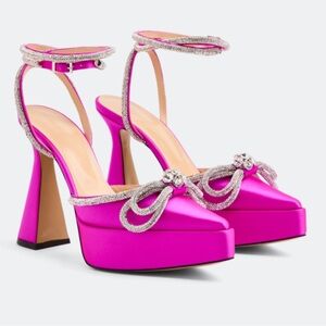 MACH & MACH
Double bow platform pumps
$1,294 size 40 US 10